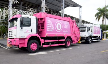 Caminhões de lixo cor de rosa circulam em campanha de conscientização da Prefeitura de Manaus