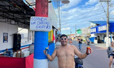 Bar instala chuveiro para refrescar brincantes em meio a onda de calor em Parintins