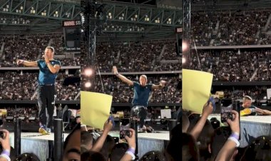 Chris Martin cai no palco durante show do Coldplay na Austrália