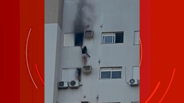 VÍDEO: apartamento pega fogo no Paraná, vítima escapa e se pendura em suporte de ar-condicionado para salvar mãe e criança