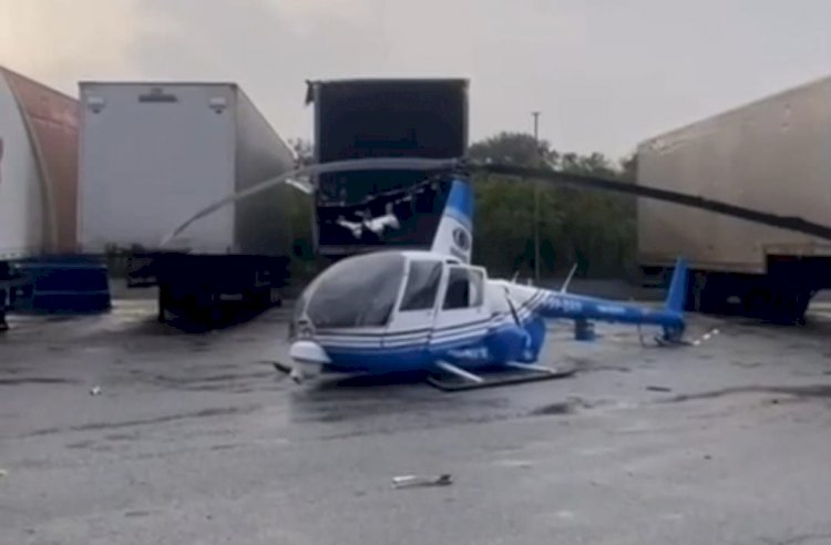 Helicóptero da Band cai na Dutra, na altura de Guarulhos